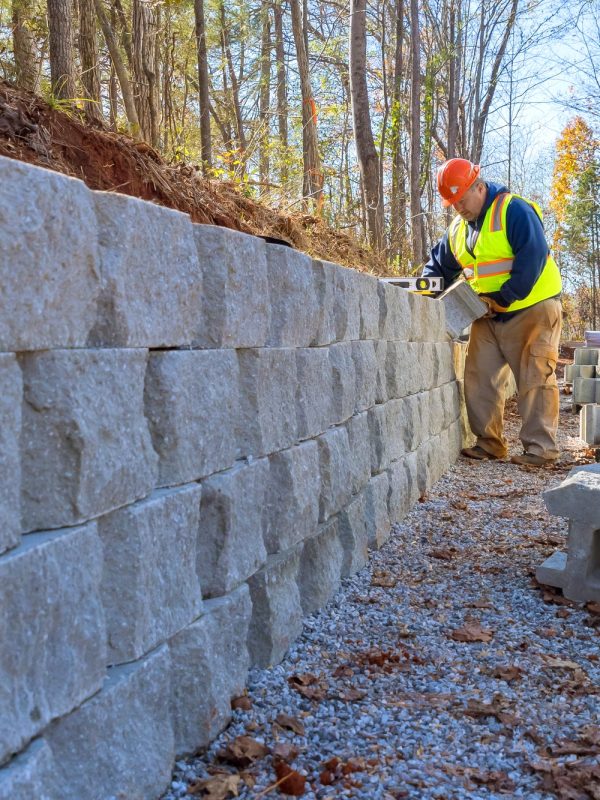 Concrete block retaining wall was mounted by a contractor Concrete block retaining wall was mounted by a contractor